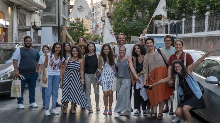 Group photo of students and instructors posing for the camera on the streets of Beirut 